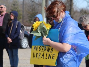 Rev.  Carol Ferguson, from St. Paul's United Church in Petrolia, attended a vigil for Ukraine held Sunday in the parking lot at Branch 216 of the Royal Canadian Legion in Petrolia.