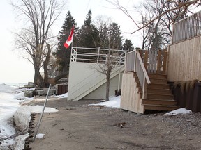 Stairways, decks and a boat house are among the encroachments into the Old Lakeshore Road right-of-way.  (Tyler Kula/The Observer)