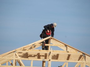 A new house goes up in a Sifton development off Kamal Drive in Sarnia. The Sarnia-Lambton Real Estate Board's president says a shortage of housing in the city is helping to drive up prices.