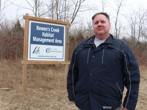 Tim Payne, manager of forestry with the St. Clair Region Conservation Authority, stands just outside the Bowen's Creek Habitat Management Area in St. Clair Township. The site, owned by Lambton County, was recently added to a federal registry of protected lands.