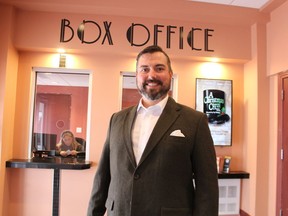 Brian Austin Jr., executive director of the Imperial Theatre in Sarnia, stands next to the box office.