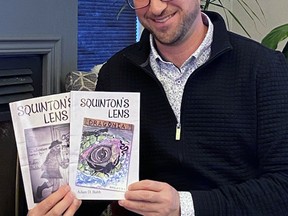 Carlingford native Adam Babb holds up two of his planned eight novellas called Squinton's Lens, an adventure series that features a young elementary school teacher Squinton Wolfe who finds himself in challenging and fantastical situations. Babb, who lives in Belmont today, is an elementary school teacher and is happy to attract young readers. SUBMITTED