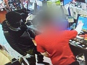 Norfolk OPP have released photos of a suspect wanted in connection to an armed robbery Saturday morning at a convenience store on James Street in Delhi.  NORFOLK OPP PHOTO