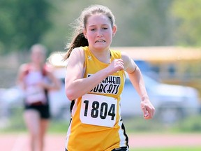 Rylee Stanford of Blenheim wins the midget girls' 3,000 metres in 12:06.16 on Day 2 of the LKSSAA track and field championship at the Chatham-Kent Community Athletic Complex in Chatham, Ont., on Wednesday, May 15, 2019. Mark Malone/Chatham Daily News/Postmedia Network
