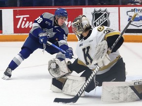 David Goyette, of the Sudbury Wolves, fires the puck past Aidan Spooner, of the Kingston Frontenacs, during OHL action at the Sudbury Community Arena in Sudbury, Ont. on Friday March 4, 2022. John Lappa/Sudbury Star/Postmedia Network
