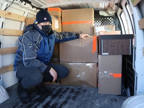 Justin Todd loads boxes into a van at the Ukrainian National Federation hall on Frood Road on Thursday. Medical and other supplies are being delivered to Toronto, and then shipped overseas to support Ukrainians.