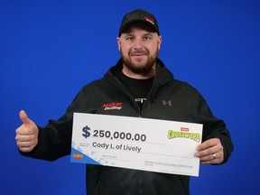 Cody Lanovaz is celebrating after winning a $250,000 top prize with Instant Crossword Deluxe. OLG