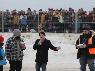 Mayor Tory Delaurier, holding the microphone, addresses the crowd at Saturday's demolition derby in Iroquois Falls. He is flanked on the right by Jesse Cybolsky, demolition derby chair, and on the left by Richard Steudle, who provided some colour commentary during the event. On the far left is Oscar Steudle.

RON GRECH/The Daily Press