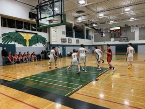 St. John's College Green Eagles defeated Paris District High School to earn a spot in the senior boys' semi-final to be played Thursday
