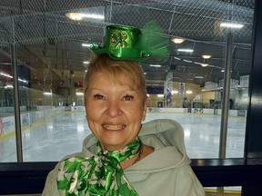 Trudy Owens, Cochrane Figure Skating Club president dons St. Patrick Day attire along with the volunteers to make them easier to be recognized to add a bit of festivity to the competition.