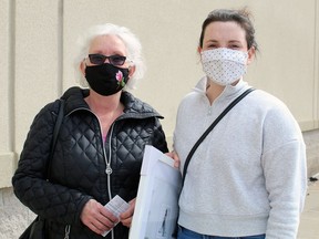 Kelly Borbely and her daughter, Elizabeth Borbely, of Woodstock decided to keep on their masks while they were shopping in Brantford on Monday.