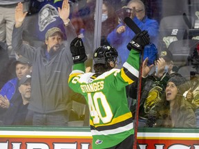 Antonio Stranges celebrates with the fans after he went coast to coast for a goal during the first period of the London Knights game against the Owen Sound Attack at Budweiser Gardens Friday night in London, Ont. Mike Hensen/The London Free Press/Postmedia Network