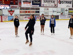 Kaetlyn Osmond, centre, gave instruction to Whitecourt Skating Club members Naomi, Isla, Shelby, Andrea and Denae.