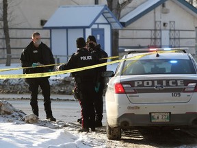 Winnipeg police investigate a suspicious death on Bannatyne Avenue at Arlington Street in Winnipeg on Sunday, Jan. 31, 2021.