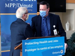 Paul Heinrich, president and CEO of the North Bay Regional Health Centre, thanks Nipissing MPP Vic Fedeli following an announcement Friday that the hospital will receive $10 million in provincial funding.
PJ Wilson/The Nugget