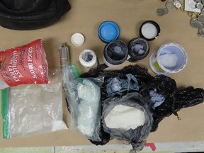 Items seized after a search warrant in Owen Sound on Friday, April 1, 2022.