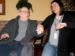 Rosemary Voight (Amanda Hicks Moss)takes the blood pressure of her father, Barry Butterfield (Harry Houston) in a scene from Sault Theatre Workshop's production of Jonas and Barry in the Home. Photographed Saturday, April 2, 2022 in Sault Ste. Marie, Ont. (BRIAN KELLY/THE SAULT STAR/POSTMEDIA NETWORK)