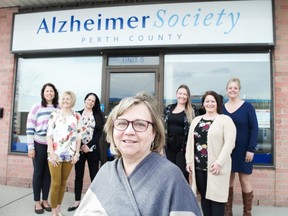 The Alzheimer Society of Canada branches in Huron and Perth counties have merged. Pictured is Alzheimer Society Huron Perth executive director Cathy Ritsema (front) and six members of the charity’s staff at their location in Stratford. Chris Montanini\Stratford Beacon Herald