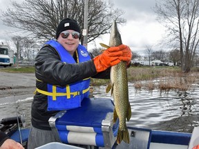 Mike Sutton, of Kingston, shows off a nearly six-pound pike he caught on the Bay of Quinte in Trenton during the Kiwanis Club of Trenton Walleye World Live Release Fishing Derby in May 2019. POSTMEDIA