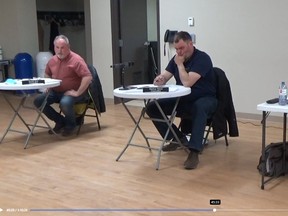 Powassan Deputy Mayor Randy Hall, left, reacts to a report from the Integrity Commissioner that he contravened the municipality's Code of Conduct. Also pictured are Councillors Markus Wand and Debbie Piekarski. Piekarski was also the subject of an investigation by the Integrity Commissioner at the same meeting over violations of the Code of Conduct.
Screen capture