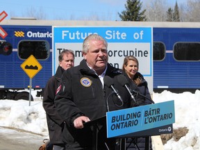Ontario Premier Doug Ford announced Sunday at the future site of the Timmins-Porcupine passenger train station on Falcon Street that the province is investing $75 million to bring passenger rail service back to Northeastern Ontario. Looking on is Timmins Mayor George Pirie and Ontario Transportation Minister Caroline Mulroney.

RON GRECH/The Daily Press