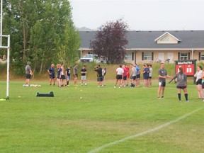 The senior women’s and men’s Grizzlies of the Bow Valley Rugby Club practice at the Mitford pitch the evening of July 27. Registration is still open, and there’s a Grizzlies program for almost all Cochranites. Patrick Gibson/Cochrane Times
