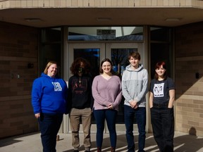 Lindsay Anderson (From left to right), Em Poudrier, Schulyer Glasman, Degan Finlay, and Rhylee Boutilier pose for a picture at Highwood High School in High River on Apr. 5. Anderson and her students attended a ceremony for the induction of George Asselbergs as a member of the righteous among the nations.