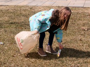 Ember Howe, 6, finds an Easter treat to put in her bag, Sunday, at Centennial Park in Callander.
PJ Wilson/The Nugget