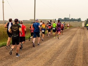 Tool Shed Duathlon participants run along a dirt road nearby to the Airdrie Pro Rodeo grounds during the 2021 event. The duathlon is making a return on June 5. Photo courtesy of Keith Cartmell Photography