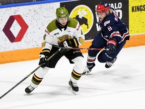 Paul Christopoulos of the North Bay Battalion lines up opposite Dawson McKinney of the host Oshawa Generals in Ontario Hockey League action Sunday. The Troops open an Eastern Conference quarterfinal series against the visiting Ottawa 67's at 7 p.m. Thursday.
Sean Ryan Photo