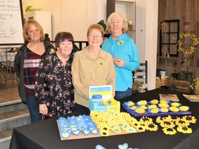 Members of the Watford-Warwick Horticultural Society will be selling crocheted hearts and sunflowers for $5 apiece as part of a fundraiser for war-torn Ukraine. From left are Joan Westgate, Holly Watson, Peg Fraczyk and Lucy Buttery. Carl Hnatyshyn/Sarnia This Week