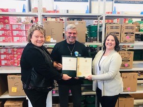 Fort Saskatchewan-Vegreville MLA Jackie Armstrong-Homeniuk, left, presented the Fort Saskatchewan Food Bank with a provincial grant on Wednesday, April 13. Photo Supplied.