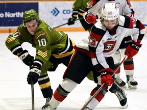 Michael Podolioukh of the North Bay Battalion pursues Tyler Boucher of the visiting Ottawa 67's in the teams' Ontario Hockey League playoff opener Thursday night. Game 2 is Saturday night at Memorial Gardens.
Sean Ryan Photo