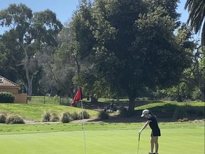 Spruce Grove's 11-year-old Shylee Kostiuk lines up a putt at the California Junior Golf Association (CJG) Spring Classic at Los Robles Greens in Thousand Oaks, Calif., in March. Photo by Larry Kostiuk.
