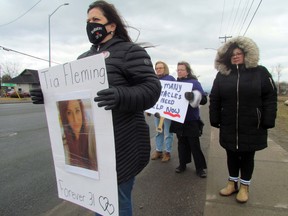 Lisa Foggia joins protesters late Thursday afternoon at the corner of Second Line and Old Garden River Road, decrying what they brand as an unjust delay to Sault Area Hospital's 20-bed residential withdrawal management program. Foggia’s daughter, 31, died of an overdose in 2020. JEFFREY OUGLER