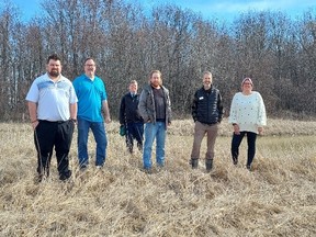 Shown from left are Coun. Anthony Ceccacci, Mayor Darrin Canniff, Lower Thames Valley Conservation Authority CAO Mark Peacock, LTVCA chair Coun. Trevor Thompson, manager of conservation lands and services Randall Van Wagner, and Julie MacDonald, of Ridge Landfill Community Trust. (Handout)