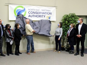 Members of the North Bay-Mattawa Conservation Authority unveil the new logo to mark its 50-year history.
PJ Wilson/The Nugget