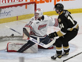Kingston Frontenacs forward Jordan Frasca scores on Oshawa Generals goaltender Zach Paputsakis for his second goal of the game in Game 2 of their Ontario Hockey League Eastern Conference quarter-final at the Leon's Centre on Sunday.