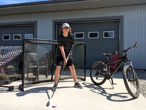 Whether it's cooking, playing hockey, working with his dad or doing anything else he wants, Stratford 14-year-old Ryley McMillan continues to show other child amputees that with the support of The War Amps, nothing can slow him down.  Galen Simmons/The Beacon Herald/Postmedia Network