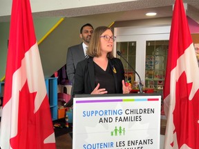 Minister of Families, Children and Social Development Karina Gould, with Calgary Skyview MP George Chahal in the background, announces grant funding for a children’s physical literacy program from a Cochrane daycare April 22. Patrick Gibson/Postmedia Network