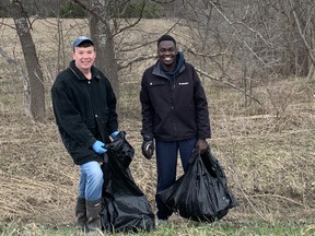 Dale Gilchrist and Eli-Akim Hawi spent their Easter weekend cleaning up the ditches along Bruce Road 1 outside of Lucknow. Hannah MacLeod/Lucknow Sentinel