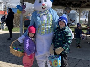 Natalie and Blake Pollock took a minute to visit the Easter Bunny after the egg-hunt in Lewis Park was finished. Hannah MacLeod/Kincardine News