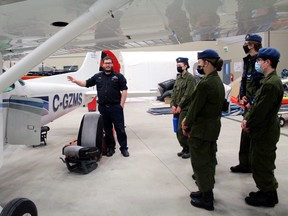 Nate Morrow of Northern Heights Aviation, explains the flight characteristics of a small airplane to members of 547 Royal Canadian Air Cadet Squadron, Saturday, during the squadron's aviation day event.
PJ Wilson/The Nugget
