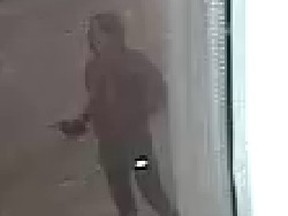 An individual is captured on security camera outside the Ukrainian National Federation building on Frood Road last Tuesday.