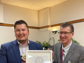 Derek Bruno posed for a photo with Bruderheim Mayor Karl Hauch in recognition of the Town's Indigenous awareness training. Photo by Gale Katchur.