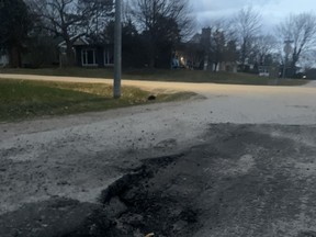 A large pothole on Pinewood Crescent was recently temporarily filled. Last year the city received 16 pothole claims, all of which were denied on the grounds the city's roads department was complaint with the applicable Minimum Maintenance Standards for Municipal Highway regulations.
