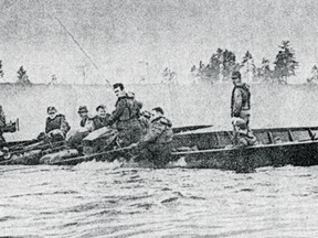 Volunteers in a rescue boat scout the Ottawa River to recover the missing paratroopers following the tragic training accident that occured of Wegner Point on May 8, 1968.
PEMBROKE OBSERVER; COURTESY OF KEN FYNN