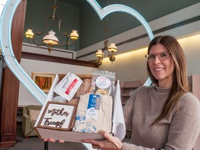 Destination Stratford’s brand manager, April Murray, showcases the Mother’s Day edition of The Love Stratford Box, a themed collection of goods from local businesses that’s been popular among residents and visitors during the pandemic. (Chris Montanini/Stratford Beacon Herald)