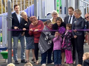 Jacquie Surgenor, chair of Sherwood Heights School Council and the Salisbury Composite High School Council, cutting the ribbon of the Westboro Elementary playground during her time on that school council. Photo Supplied