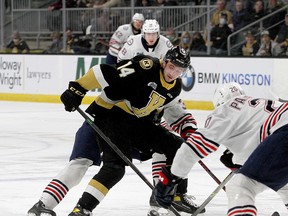 Kingston Frontenacs forward Jordan Frasca,tries to get past Oshawa Generals defenceman Nikita Parfenyuk in Game 5 of their Ontario Hockey League Eastern Conference quarter-final at the Leon's Centre on Saturday.